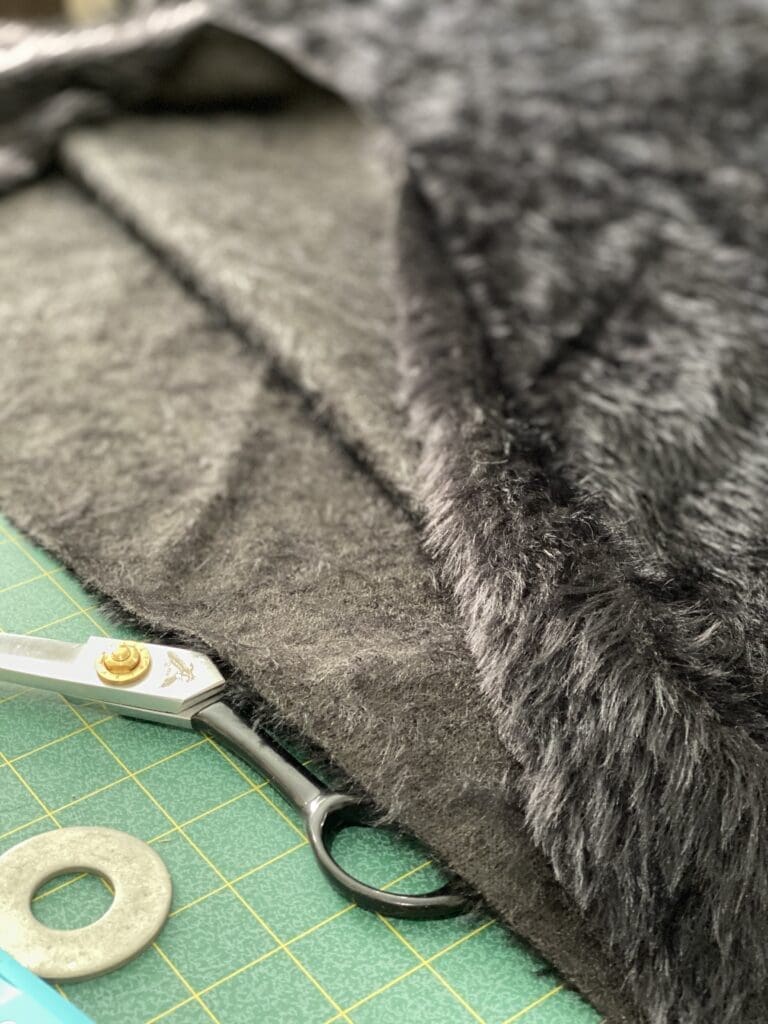 Silky black faux faur fabric