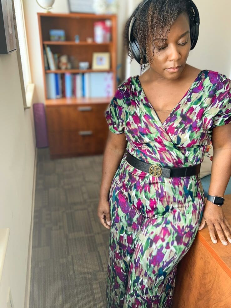 African-American woman standing in her office wearing McCall's 8047 with a black Tory Burch belt