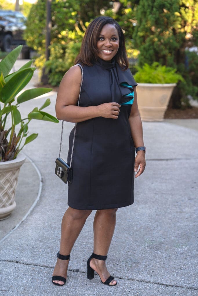 African American woman wearing Vogue 1513 standing in a park