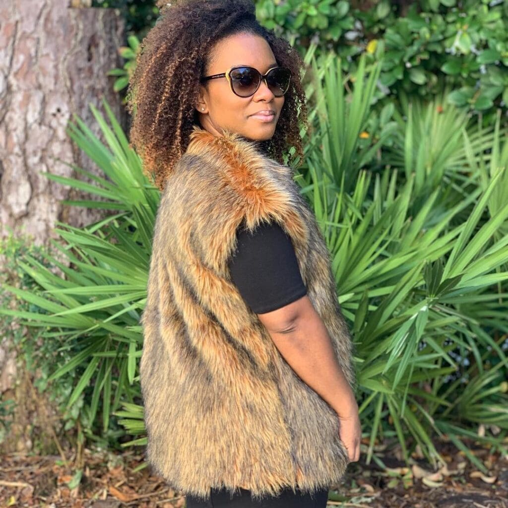 African American Woman with shades Faux fur Butterick 5359