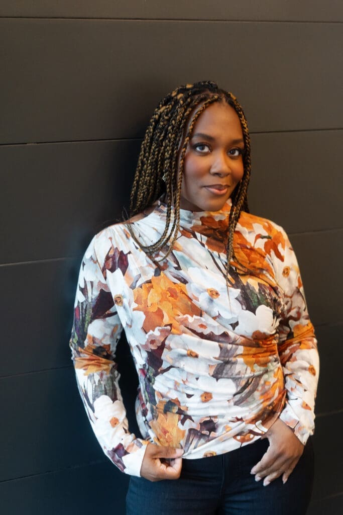 African American woman standing wearing Simplicity 9451