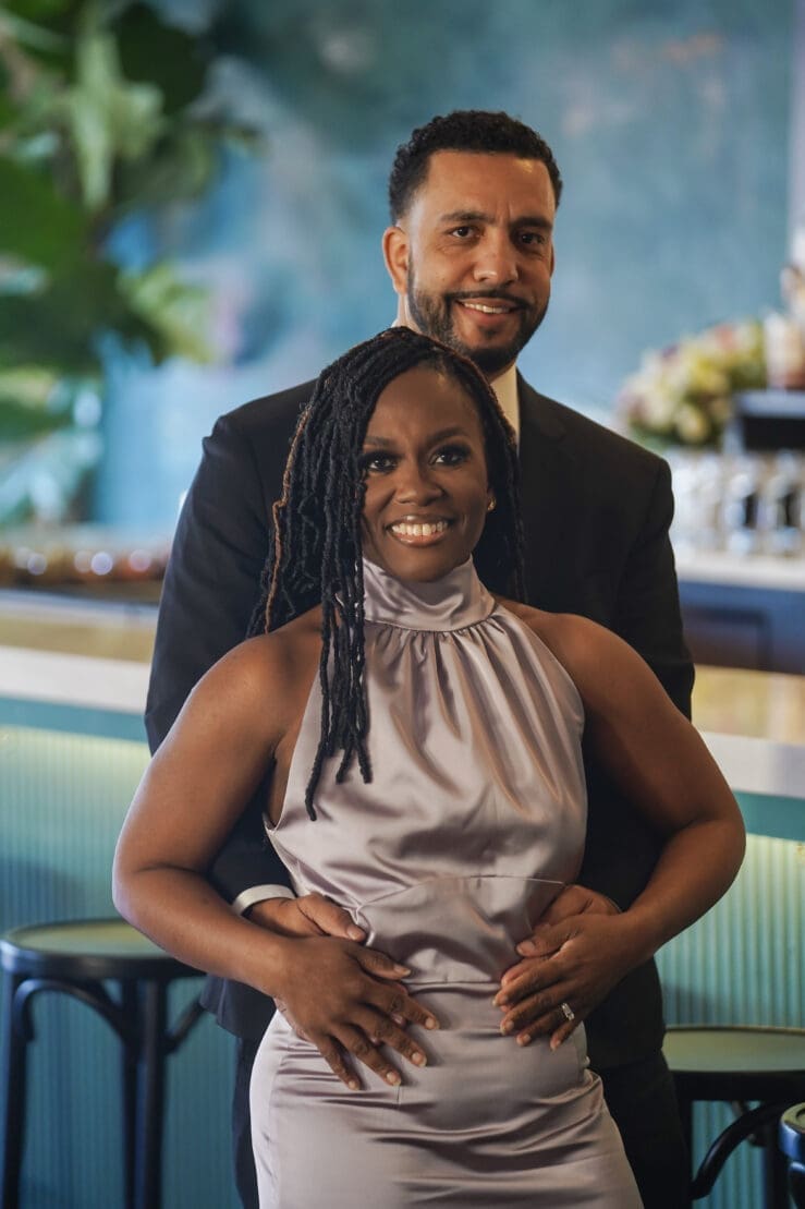 Couple at restaurant woman wearing Mccalls 8141 view C in silver satin