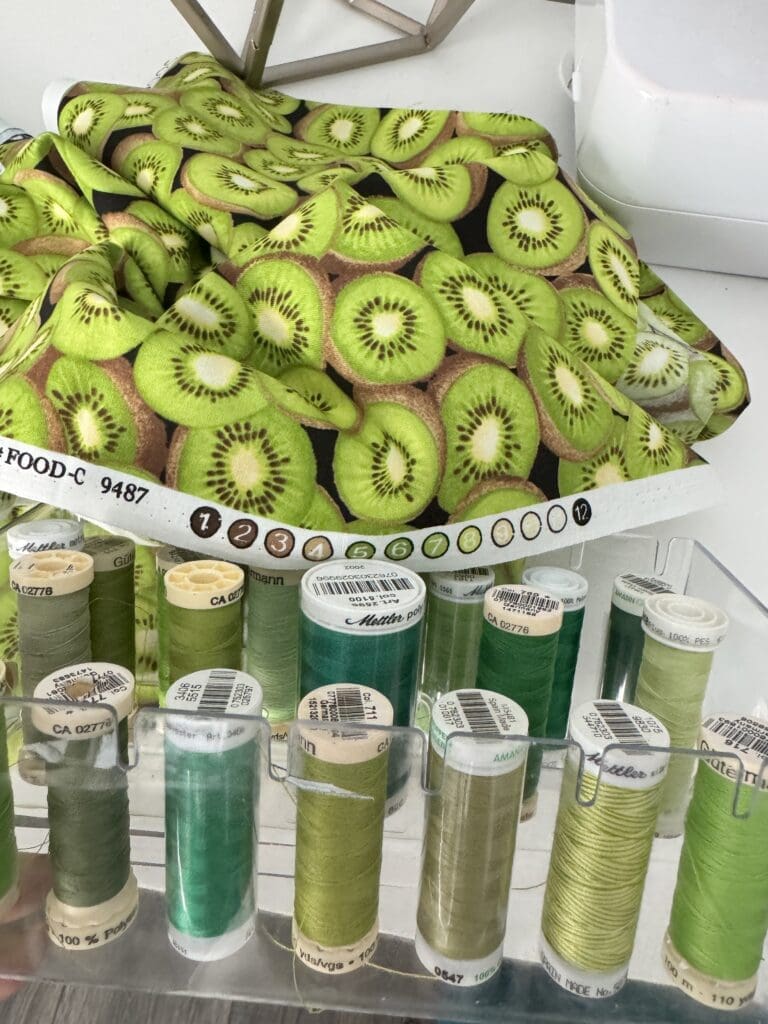 kiwi fabric with colored coded dots and matching thread