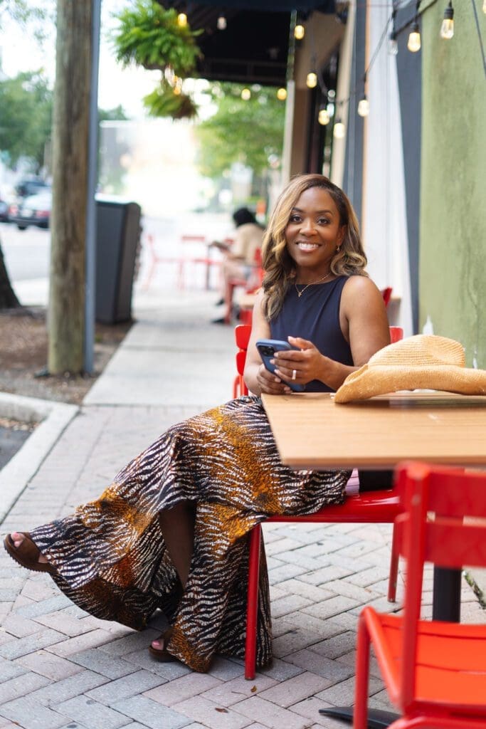 Shontae in Vogue 1941 Ankara skirt seated